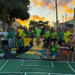 Michelly Alencar participa de ação comunitária para resgatar tradição das ruas decoradas para a Copa do Mundo